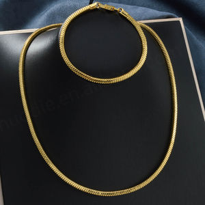 ชุดสร้อยคอและกำไลข้อมือทองชุบ 14K ดีไซน์เรขาคณิตคลาสสิกสีทองสำหรับงานแต่งงานและงานหมั้น ขายส่ง - Product Image 1