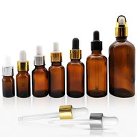 Emballage rond personnalisé de luxe pour soins de la peau Flacon compte-gouttes en verre ambré de 5ml 10ml 15ml 30ml 50ml 100ml d'huile essentielle