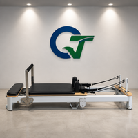 Machine de Pilates pliable en alliage d'aluminium durable QT, avec coffret en bois, garantie de 3 ans, portable pour la maison, le studio et les exercices corporels