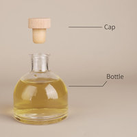 Bouteille diffuseur de parfum en verre transparent minimaliste ronde de 160 ml, vide, avec couvercle en bois naturel, par Eric Custom