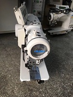 Machine à coudre surjeteuse industrielle d'occasion Jukis 2290-7 pour vêtements