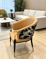 Fauteuil moderne de luxe à motif phénix avec structure en métal doré, design pour l'hôtellerie et l'ameublement domestique