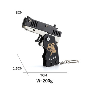 Legierung Kunststoffplatte Gummiband-Pistole Schlüsselanhänger Farbige <span class=keywords><strong>Mini</strong></span>-Gummiband-Pistole Kinderspielzeugpistole - Product Image 2