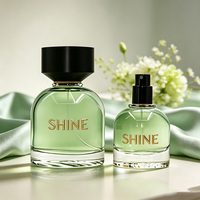 Flacon de parfum élégant et transparent de qualité supérieure, 30 ml, 50 ml, 100 ml, flacon en verre vide avec pulvérisateur à pompe et impression sérigraphique, bouchon noir