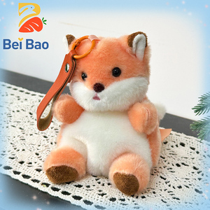 Plushie Factory Porte-clés et breloque de sac <span class=keywords><strong>renard</strong></span> en peluche assis, mignon et kawaii, avec logo personnalisé, pour machine <span class=keywords><strong>à</strong></span> griffes et pendentif de sac <span class=keywords><strong>à</strong></span> dos, en stock - Product Image 1