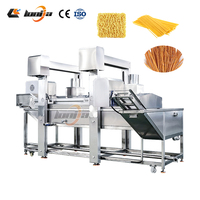 Machine à frire les œufs de caille 500 kg/h, machine à faire des nuggets de poulet, machine à frire les craquelins de porc avec bande transporteuse à mailles anti-flottantes