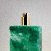 Flacon de parfum rectangulaire vide personnalisé de couleur verte, flacon de parfum de luxe unique en verre avec surface texturée en pierre