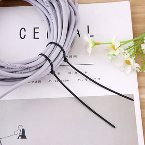 Self Locking Nylon Cable Ties White And Black 100 Piece Pack For Cable Bundling Organization Storage Cell Phone Use - Product Image 3
