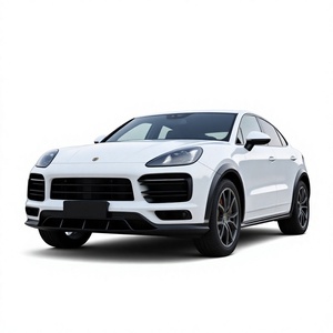 วัสดุคาร์บอนไฟเบอร์ยี่ห้อ Runde สำหรับอัพเกรดรถ Porsche Cayenne ชุดแต่งสไตล์ CMST ประกอบด้วยลิ้นหน้า สเกิร์ตข้าง คิ้วล้อ สปอยเลอร์หลัง - Product Image 1