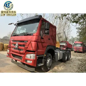 Howo 6x4 nuovo pneumatico nuova cabina trattore pesante camion testa 371hp 375 Hp usato trattore camion prezzo per la vendita