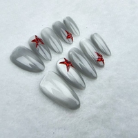 Uñas a presión al por mayor; forma de uña de almendra pintada a mano estilo estrella roja; alta calidad reutilizable.