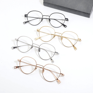Montura de Gafas Redondas de Titanio Puro al por Mayor de Fábrica, Montura Óptica Vintage de Borde Delgado para Gafas Graduadas de Miopía - Product Image 1