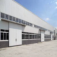 Bâtiment en structure d'acier préfabriquée pour ateliers, entrepôts, conception industrielle, résistance personnalisable aux charges/vent