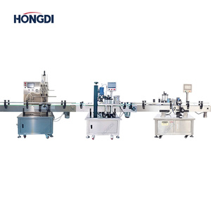 Línea de Llenado de Líquidos y Pastas Totalmente Automática para Vino, Leche, Cerveza, Agua con Gas, Capacidad de 6000 bph/h, Control PLC con Pantalla Táctil - Product Image 1