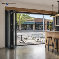 Porte pliante en aluminium moderne avec isolation thermique et double vitrage pour salon de villa
