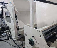 Machine à rembobiner les rouleaux de draps jetables non tissés pour hôpitaux, examens, spas, salons et la fabrication de rouleaux de papier de protection pour lits
