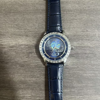 Nuevo Reloj Mecánico Automático con Esfera Giratoria de Cielo Estrellado, Tierra y Luna, Bisel con Pedrería, Correa de Cuero de Lujo para Hombre