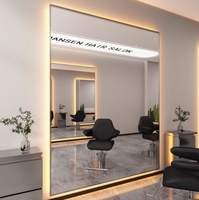 Miroir professionnel de salon moderne à LED pleine longueur avec cadre argenté rétroéclairé et contrôle tactile, lumière chaude, vente en gros