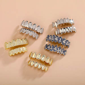 ฟันปลอมประดับเพชรเต็มรูปแบบสำหรับผู้ชายและผู้หญิงสไตล์อเมริกันแบบยุโรปบุคลิกตลกเขี้ยววันฮาโลวีนตะแกรงทอง - Product Image 1