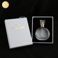 Boîte cadeau de luxe pour parfum avec couvercle et base en carton rigide, logo personnalisé en feuille métallique, texture, boîte de parfum avec découpe et éponge floquée noire