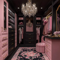 Armoire de chambre à coucher noire, blanche et rose, avec placage bois sculpté, poignée métallique de style mid-century, porte battante, meuble de rangement.