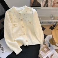 Nuevo diseño al por mayor cárdigan perla lujo bolsillo cárdigan mujeres solo pecho cuello redondo elegante mujeres suéteres