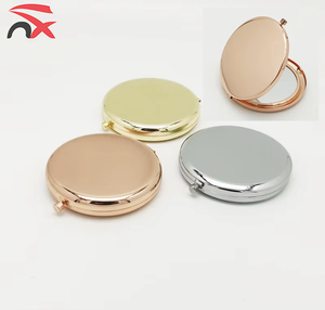 Custom logo Nuoxin Factory Wholesale Metal Small Round Metal Compact Makeup Mirror for Beauty