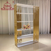 Étagère de rangement moderne dorée avec verre/MDF pour mariages et utilisation à vin en tant que présentoir