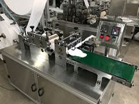 Machine de fabrication de serviettes hygiéniques à ultrasons entièrement automatique