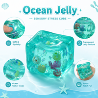 Vente en gros d'usine - Cube d'eau transparent sur le thème de l'océan avec des étoiles scintillantes et des coquillages - Jouet souple en TPR à presser - 4,5 cm - Mini pour enfants et adultes