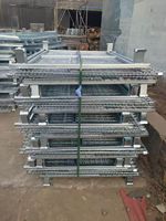 Cage à palettes en treillis métallique galvanisé avec porte basculante et loquet de boucle pour le transport de pièces en entrepôt industriel