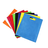 Op maat gemaakte bedrukte logo's, warmtegeperste, niet-geweven, platte, geperforeerde handtas, kleding- en boodschappentas