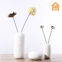 Çin tedarikçisi çizgiler tahıl beyaz seramik vazo ev dekor