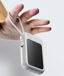 Produit le plus vendu 2024 Banque d'alimentation solaire haute capacité 10000mah Banque d'alimentation solaire <span class=keywords><strong>20000mah</strong></span> Intégré 4 câbles avec lumière LED - Product Image 4