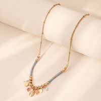 Collier Bohème Rétro Vintage pour Femme, Chaîne Figaro en Acier Inoxydable Plaqué Or Enroulée à la Main, Perles Petites