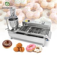 Machine automatique de haute qualité pour la fabrication et la friture de mini-beignets glacés au gaz, modèle Lil Orbits, pour usage commercial et industriel, à vendre