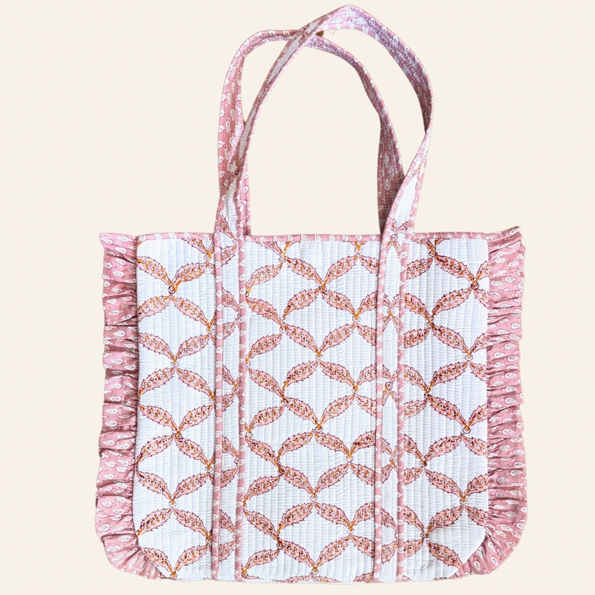 bolso de mano con volantes y estampado rosa
