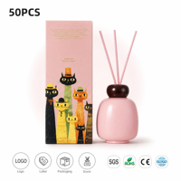Diffuseur à bâtonnets 220 ml, bouteille en céramique bicolore, col décoratif Sauge & Orange, bâtonnets verts, décoration intérieure, marque privée