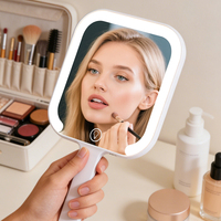Espejo de Maquillaje Iluminado, Espejo de Aumento con Luz y Brillo Ajustable, Espejo de Mano con Mango