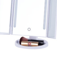 Miroir de maquillage de table de courtoisie d'écran tactile de lumières LED pliables de trois manières d'approvisionnement d'usine