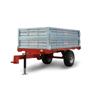 <span class=keywords><strong>Remolque</strong></span> galvanizado para un tractor agrícola móvil de <span class=keywords><strong>dos</strong></span> ruedas con componentes de engranajes, adecuado para operaciones de vertido agrícola - Product Image 1