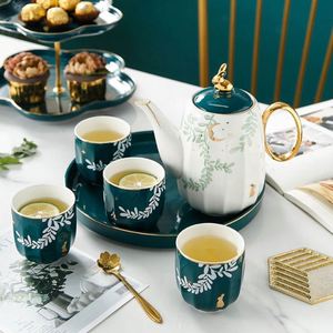 Juego de Tazas de Té de Cerámica con Diseño Rústico Rural de Hojas Verdes y Luna, 4 Tazas y 1 Tetera - Product Image 2