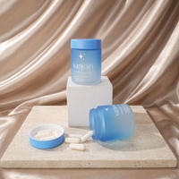 Vente en gros de flacons en verre givré bleu mat, flacons ronds vides pour capsules, flacons à pilules, impression personnalisée, contenants en verre pour les soins de santé