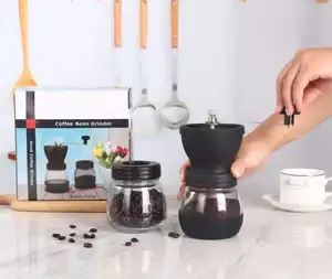 Multifunctionele Groothandel Op Maat Goedkope Handkoffieboon Burr Grinders Mini Draagbare Glazen Pot Handmatige Koffiemolen Te Koop