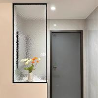 Cloison de séparation en verre trempé à effet d'ondulation verticale Aoleidun, cadre en métal noir, semi-transparente, texturée