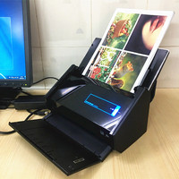 Scanner couleur portable Fujitsu iX500, recto-verso, avec suppression automatique des pages vierges, ADF sans fil, pour la numérisation de fichiers à domicile ou au petit bureau.