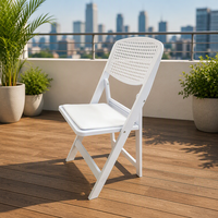 Chaise pliante moderne en résine blanche avec dossier confortable et assise rembourrée, empilable, légère, portable, écologique, pour le jardin