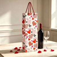 Sacs cadeaux pour vin de la Saint-Valentin, sacs en papier imprimés avec des cœurs pour l'emballage de cadeaux de fête de la Saint-Valentin