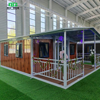 Grain de bois Terrasse Toit triangulaire Déplacement extérieur Portabilité Salle d'expansion Maison