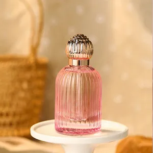 Botella de perfume personalizada única en relieve y tapa redonda de capullo para niñas y mujeres